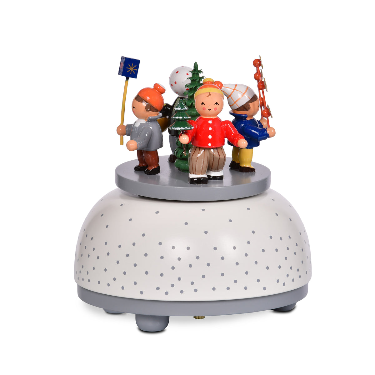 Original KWO Spieldose Winterkinder 13007 aus Holz mit handbemalten Figuren und Weihnachtsbaum auf grau-weiß gepunktetem Sockel.