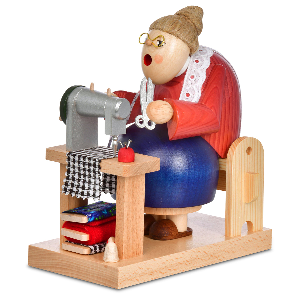 Räuchermann Schneiderin  sitzend Art. 21011 Serie Die Bärtigen, 18 cm hoch, mit Nähmaschine und feinen Details.
